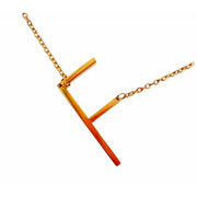 Initial necklace F slanted in gold