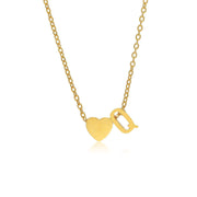 Letter Q Tiny Heart Initial Necklace in gold