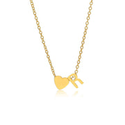 Letter R Tiny Heart Initial Necklace in gold